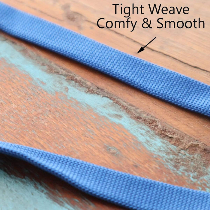 Close-up of a blue, tightly woven and smooth 25 Pack Bulk Double-Ended Lanyards with Bulldog Clips on Each Side Assorted Colors lying on a wooden surface, with text noting "Tight Weave, Comfy & Smooth.