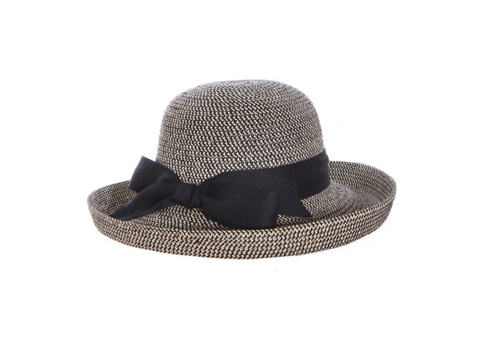 Backbow Roller Sunhat. Packable Straw Braid Roller Sunhat featuring a classic kettle-style upturned brim,  and an adjustable drawstring inner band for a customized fit. The black woven straw hat is accented with black grosgrain banding around the base of the crown and a prominent black fabric bow at the back, shown against a solid white background.
