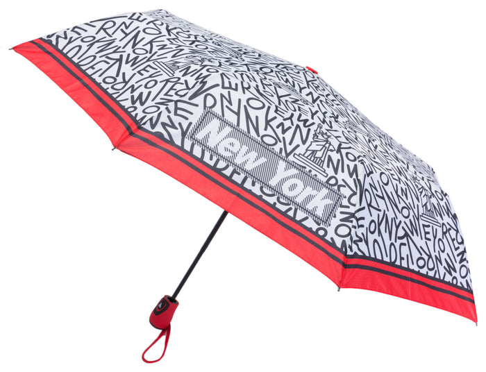 White‑backed and covered edge to edge with bold black “NEW YORK” lettering, this umbrella subtly reveals iconic city landmarks within the letter shapes. Four standout “NEW YORK” words appear on alternating panels in black block letters, each set inside a white panel framed by black‑and‑white stripes. Finished with a red‑and‑black rim, bright red finial and handle, and one‑button open.