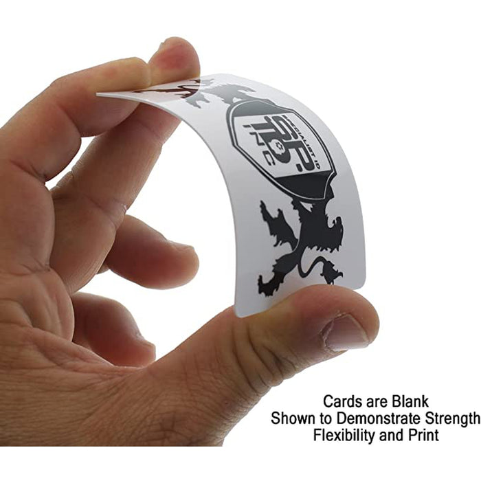 Hand bending blank white CR80 PVC card to show flexibility