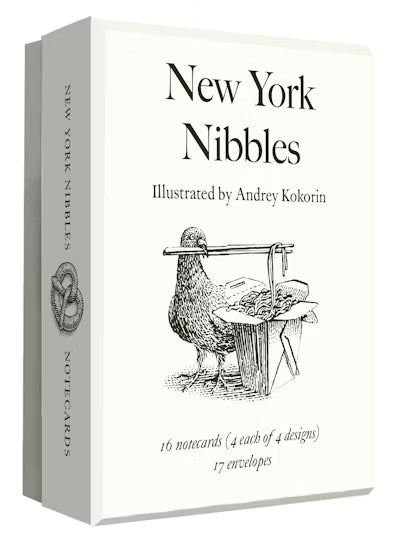 Packaging of 'New York Nibbles' notecards with illustration of a pigeon eating lo mien, and text.