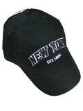 This classic black baseball cap is made from smooth cotton fabric. The front features “New York” in raised black embroidery with a crisp white stitched outline, creating subtle contrast. Centered below, “EST. 1664” appears in smaller raised white lettering. Designed for comfort, it includes an inner sweatband and an adjustable back strap. Simple and timeless, it’s available in multiple colors.