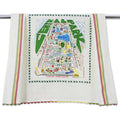 The image shows the Central Park Dish Towel displayed flat against a white background. The towel features a colorful illustrated map-style design highlighting iconic Central Park landmarks, pathways, lakes, bridges, monuments, and recreational areas. Bright greens, blues, and warm accent colors create a lively, hand-drawn look, celebrating the park’s natural beauty and beloved attractions in the heart of New York City.