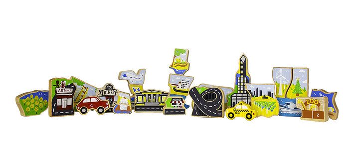 The image shows all of the wooden cutout pieces laid out horizontally without the tray. Each piece is painted in bright, cheerful colors, allowing the different shapes and city‑themed designs to stand out clearly against the white background.