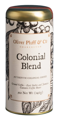 The image shows a tall, upright coffee canister with a smooth matte gold finish and a round, re‑sealable gold lid, holding 5 ounces of roasted ground Colonial Blend coffee. The cylindrical metal tin is wrapped in an 18th‑century–inspired label featuring an ink‑style illustration of a coffee plant with clustered cherries, vintage serif typography, and the Oliver Pluff & Co. logo.