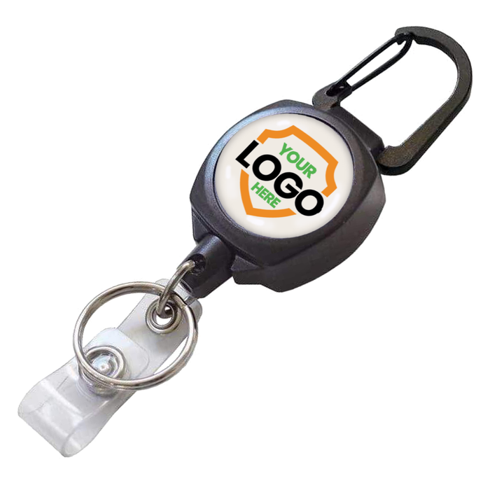 A Custom Compact Key-Bak Retractable Carabiner ID Badge Reel with Key Ring and Your Logo with a retractable Kevlar cord and a ring for attaching items. The front label has a placeholder indicating "YOUR LOGO HERE." Perfect for securely holding your essentials.