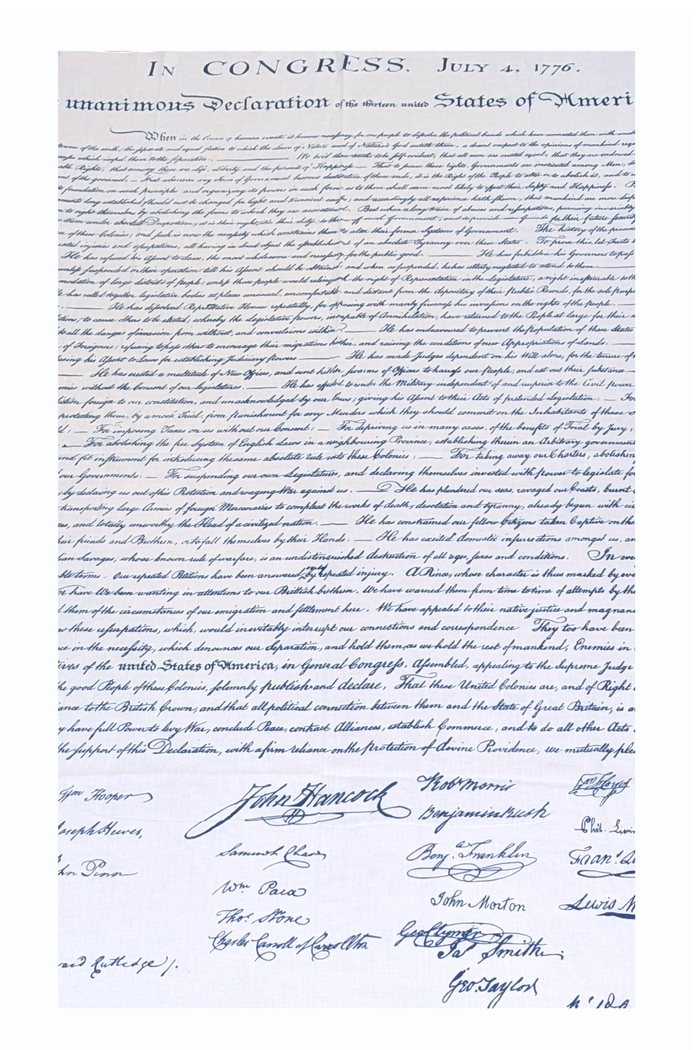 This lightweight rectangular scarf is soft and smooth with a slightly linen‑like texture. It is beige, resembling aged parchment, and printed in black with the opening text of the U.S. Declaration of Independence, including “IN CONGRESS, JULY 4, 1776.” The text appears toward one or both ends, allowing it to be felt lightly through the fabric when draped or wrapped.