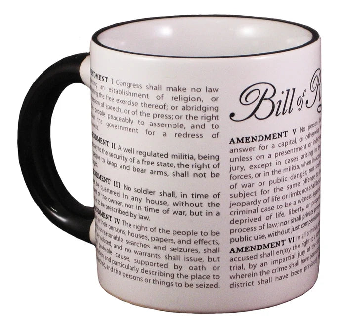 A white round ceramic mug printed with the text of the Bill of Rights, shown on a white background.