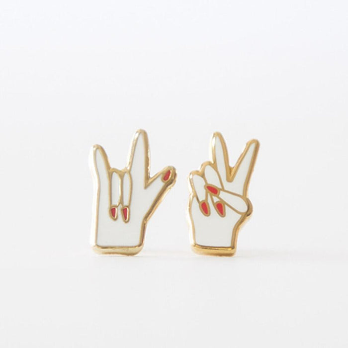 Earrings: By Yellow Owl Workshop