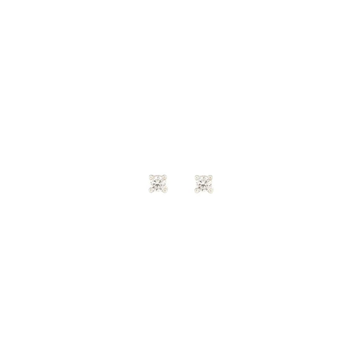 A matching pair of tiny round stud earrings featuring clear, sparkling crystals set in polished sterling silver. Delicate and lightweight, they sit close to the earlobe and catch the light with a subtle diamond-like shimmer.
