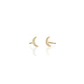 A matching pair of petite crescent moon stud earrings, each covered in tiny sparkling clear crystals. Delicate and lightweight, they have a celestial look with a subtle shimmer and are about the size of a small pencil eraser.