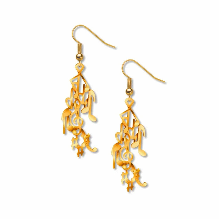 Gold earrings with intricate design of musical notes on a white background