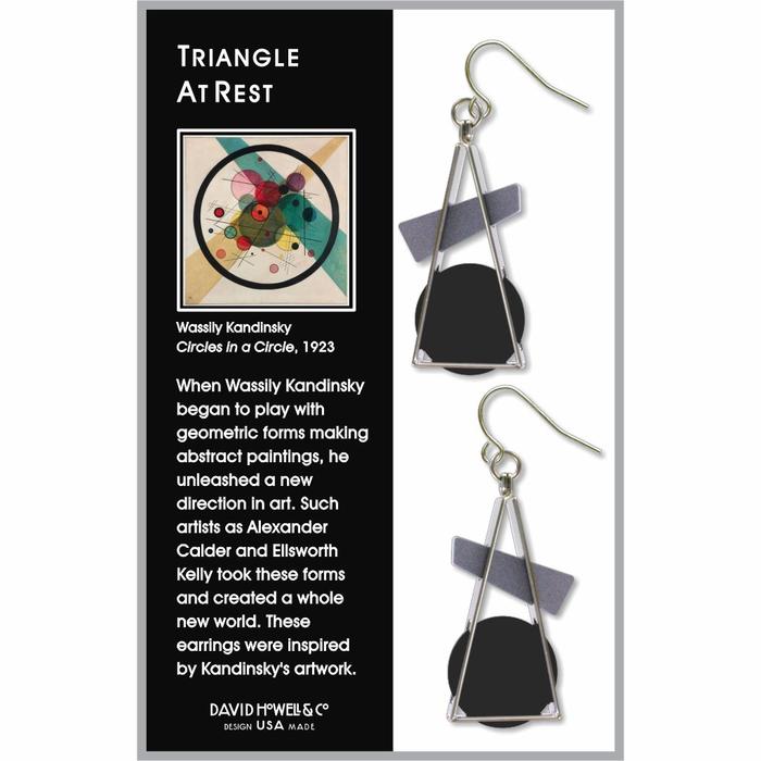 Triangle at Rest Earrings in black displayed in gift packaging with a provenance card.