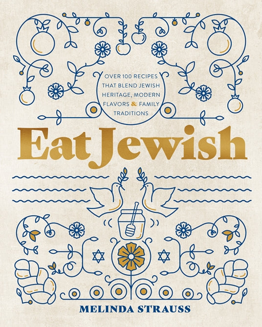 Book title: Eat Jewish. A blue line folk‑art drawing shows apples, doves, a honey jar, and challah bread against a white background. The title appears in the horizontal center of the cover, set in mustard‑yellow lettering.