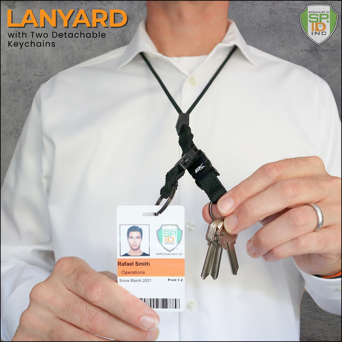 A person wearing the EK Black Lanyard With Two Detachable Key Rings by EK USA, holding keys in their hand. Sold by Specialist ID.