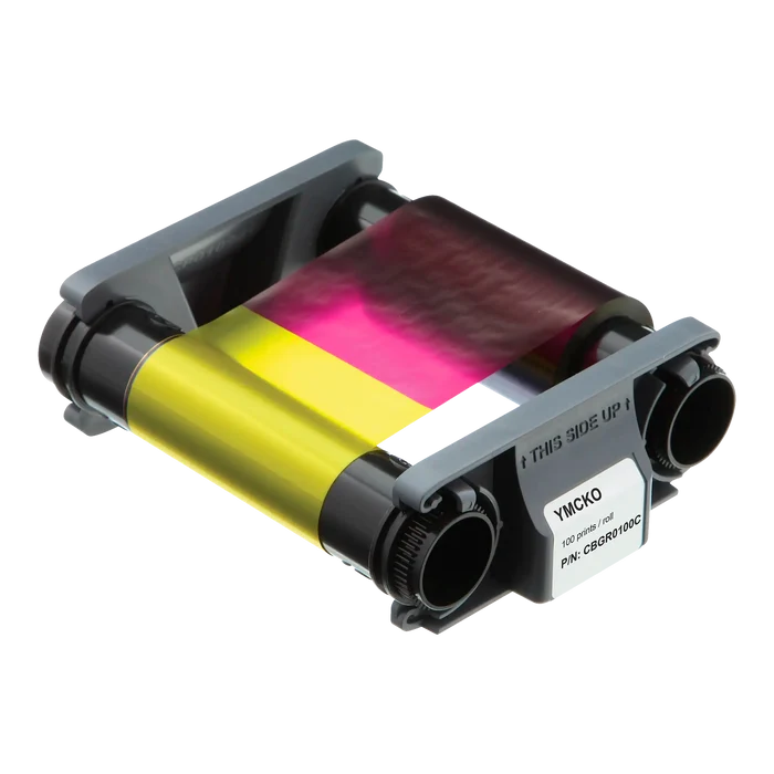 The Evolis CBGR0100C YMCKO Color Ribbon - 100 Prints, for Badgy100 & Badgy200 ID Card Printers features yellow, magenta, cyan, black, and overlay panels. It is partially unwound with gray plastic spools and labeled with part number CBGR0100C.