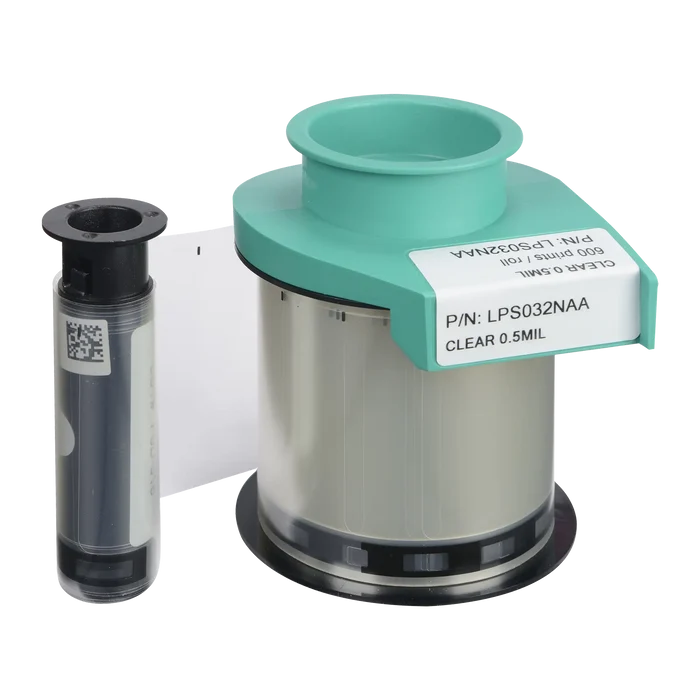 A close-up of two printer components: a roll of Evolis LPS032NAA Clear Patch Laminate with a green top, labeled "P/N: LPS032NAA," and a smaller cylindrical cartridge, ideal for use with Avansia Lamination ID Card Printers.