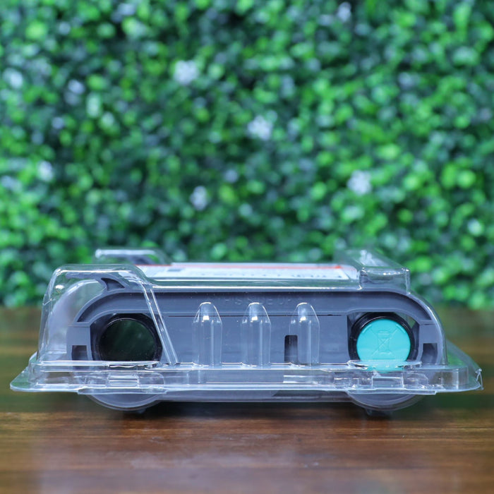 Back view of the Evolis RCT217NAAA metallic silver monochrome ribbon showing spool ends and teal locking notches inside sealed clamshell packaging. Photographed and sold by Specialist ID, an authorized Evolis dealer.