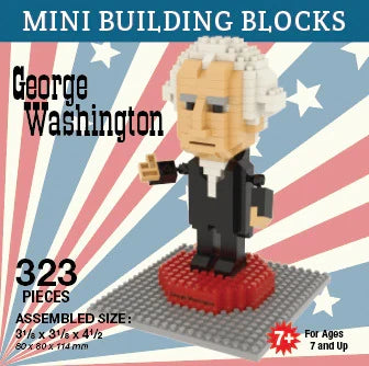 A small, detailed George Washington figure stands about 4.5 inches tall, built from tiny interlocking blocks and dressed in a long, dark 18th-century coat with calm, steady features. An American flag backdrop behind him creates a strong, patriotic setting.