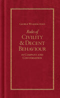 The hardcover edition of George Washington’s Rules of Civility & Decent Behaviour is a compact, pocket-sized book designed to resemble a colonial-era text. It features a deep red, faux leather cover with embossed lettering and decorative details, stamped in gold foil on the front and spine. The elegant title is centered in ornate typography. Measuring about 4 by 6.5 inches, it serves as a tactile and visually appealing keepsake reminiscent of an 18th-century manuscript.