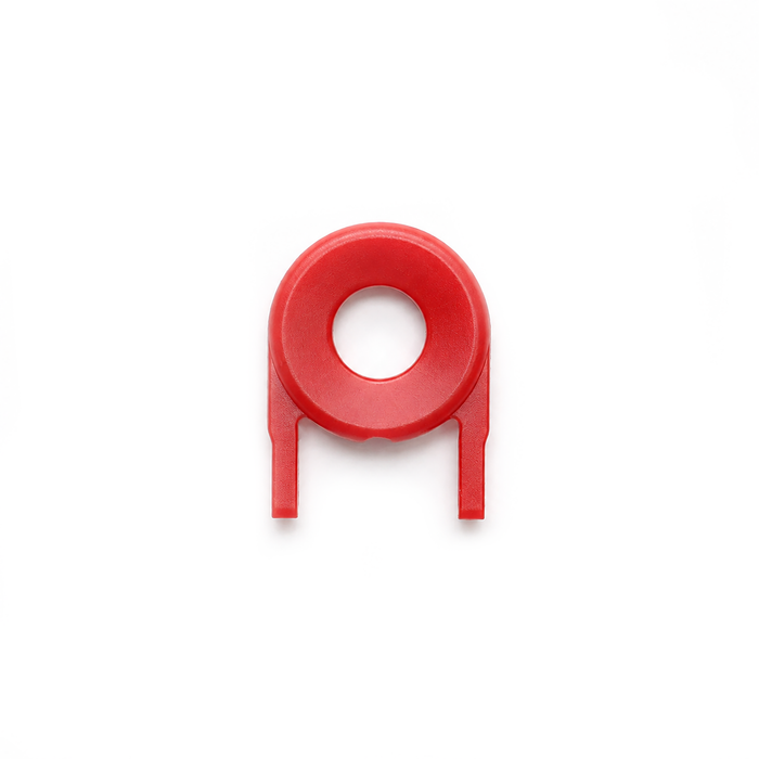 A Guard Key For Locking Card Holder (P/N 1840-6615) in red plastic, featuring a rigid design with a circular center hole and two downward prongs, is shown against a white background.