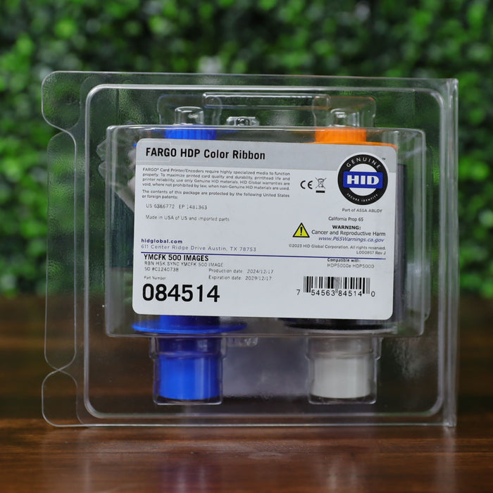 Front-facing view of the HID Fargo 84514 YMCFK ribbon in upright position with the box label and ribbon panels clearly displayed. Photographed and sold by Specialist ID, an authorized HID Fargo dealer.