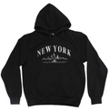 Front-facing black pullover hoodie laid flat against a white background, featuring a kangaroo pocket and matching drawstrings. Across the chest, “NEW YORK” appears in bold white Times Roman-style lettering, with the lower half of the text blending into a detailed white New York City skyline. Beneath the skyline, a white outline of a taxi rides along a horizontal line with dashed lane markings, evoking a classic New York street scene.