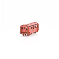 A small, salmon-pink wooden model shaped like a classic New York City subway car. The body is long and rectangular with smooth edges and simple cut‑out details suggesting windows and doors. The surface is flat and painted in a bold, uniform  salmon-pink, giving it a clean, graphic feel. It stands upright on its base and captures the familiar silhouette of an NYC train in a compact, tactile form.