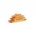 Staten Island Ferry Wood Model — 
A flat‑packed wooden model made of thin, smooth pieces with clean edges. Each piece is flat and lightweight, printed in bright orange with no raised texture. When assembled, the pieces slot together to form a simple, rectangular ferry shape with stacked layers suggesting decks. The finished model is small, sturdy, and has no moving parts.
