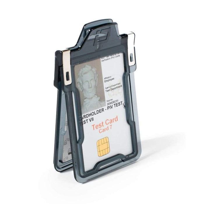 A black plastic Identity Stronghold RFID Blocking Secure Badgeholder Classic - Holds 1 Card - Shields 13.56MHz Signal (IDSH1004-001B-002) with a clear front contains a test card featuring an RFID blocking chip and the word "Test Card" alongside an image of a historic figure.
