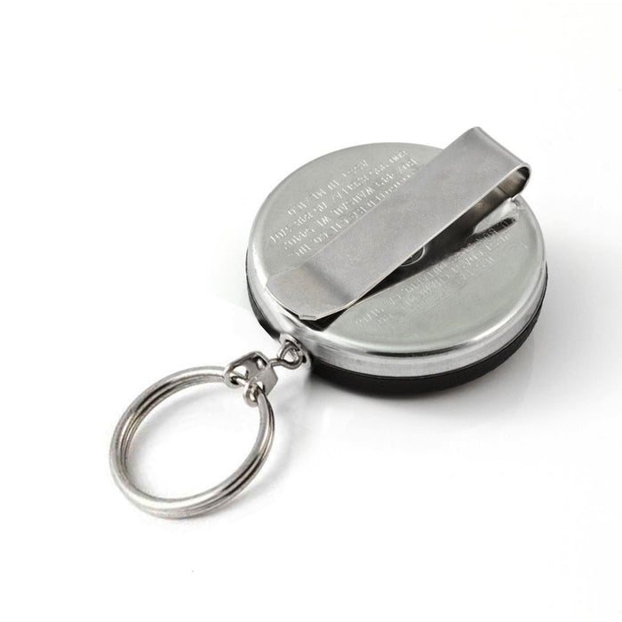 A round, metal keychain with a clip attached, shown from a top angle, featuring a durable Key-Bak #5B Self Retracting Heavy Duty Key/Badge Reel.