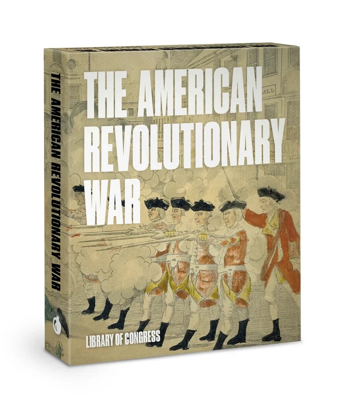 The image shows packaging for What Happened Here? The American Revolutionary War knowledge cards. The cover depicts British soldiers in red coats firing muskets, with white puffs of smoke rising from the gunfire, set against a muted, antique battlefield scene. The title appears in bold, all‑caps white text, while the Library of Congress logo is positioned on the lower left, overlaid onto the ground of the painting.