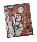 Book title: Last Survivors. The cover shows a graffiti tag on a distressed subway wall in black, white, and rust tones.