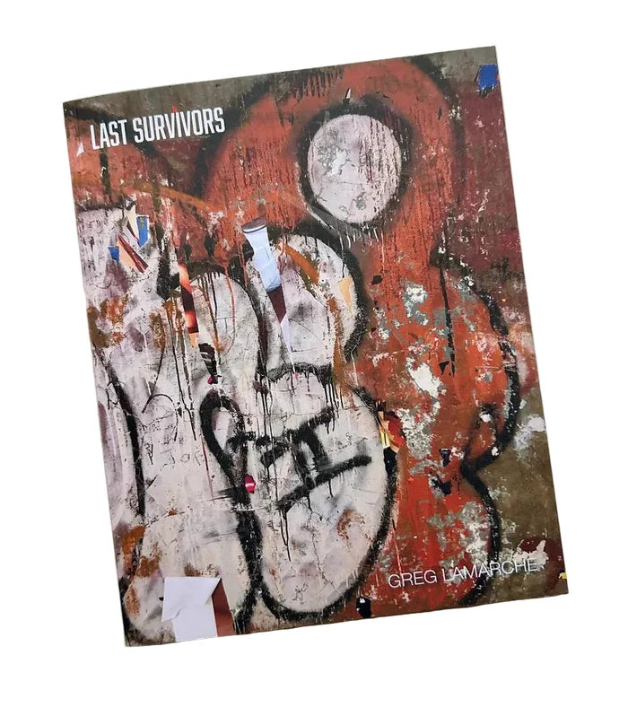 Book title: Last Survivors. The cover shows a graffiti tag on a distressed subway wall in black, white, and rust tones.