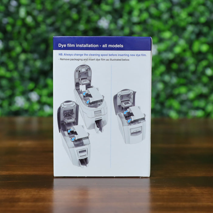 Back of Magicard MA1000K-RED ribbon box showing step-by-step dye film installation instructions for all compatible Magicard printer models. Photographed and sold by Specialist ID, an authorized Magicard dealer.