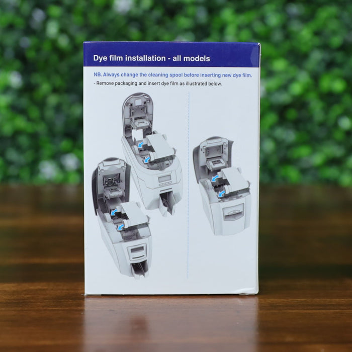 Back of the Magicard MA1000K-White ribbon box showing dye film installation instructions for all Magicard printers. Includes step-by-step visual diagrams demonstrating how to insert the ribbon properly into the printer. Photographed and sold by Specialist ID, an authorized Magicard dealer.