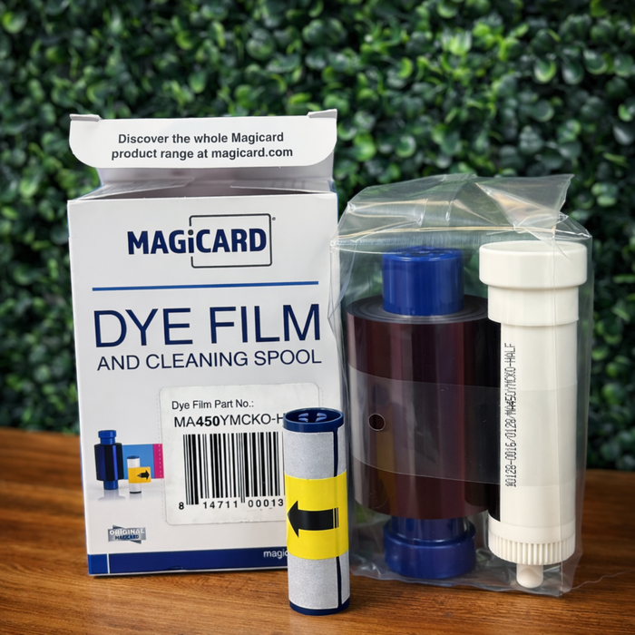 Magicard MA450YMCKO-HALF Color Ribbon for Enduro+, Enduro3E, and Rio Pro ID Card Printers (450 prints) with cleaning spool kit, including all components, are displayed on a wooden surface.