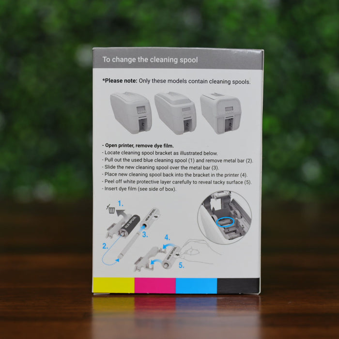 Box containing instructions and diagrams for installing the Magicard MB600KO Black Ribbon with Overlay (600 prints) in a Magicard 600 Printer, featuring labeled steps and compatible model details for monochrome ID card printing.