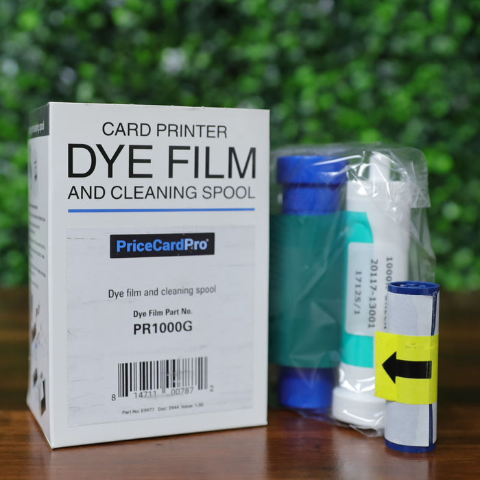 Magicard PR1000G green monochrome ribbon kit including retail box and three-piece spool set. Box displays part number PR1000G and barcode 814711007872. Spools include labeled dye film, white cleaning spool, and yellow arrow indicator. Photographed and sold by Specialist ID, an authorized Magicard dealer.