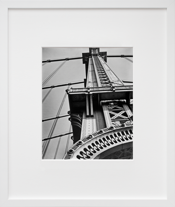 Manhattan Bridge, Looking Up by Berenice Abbott in white frame