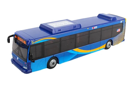 Shows the officially licensed MTA toy bus in the new blue livery, featuring layered shades of transit blue with flowing yellow wave accents inspired by city motion and energy, plus modern graphics that echo New York’s updated, forward‑looking fleet design.