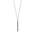 Shown on a white background, the Long Whistle Necklace features a slim, four‑inch raw brass whistle pendant hanging from a long antiqued brass cable chain. The whistle is fully functional with a crisp sound and has a smooth cylindrical shape that feels solid and slightly cool to the touch. The long chain closes with a lobster clasp and allows the piece to hang low on the chest or be wrapped for a shorter fit, giving the necklace a vintage, utilitarian look with both decorative and practical purpose.