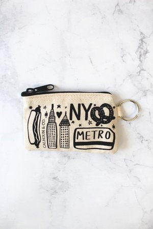 New York Screen Printed Coin Pouch, white background and black line drawing: A small, soft fabric pouch with a smooth, flat surface and a zipper along the top edge. The pouch is rectangular and lightweight, easy to hold in one hand. The front is printed with bold, high‑contrast New York–themed graphics—clean shapes and simple lettering—with no raised textures. The fabric feels flexible but sturdy, designed to hold coins or small items securely.