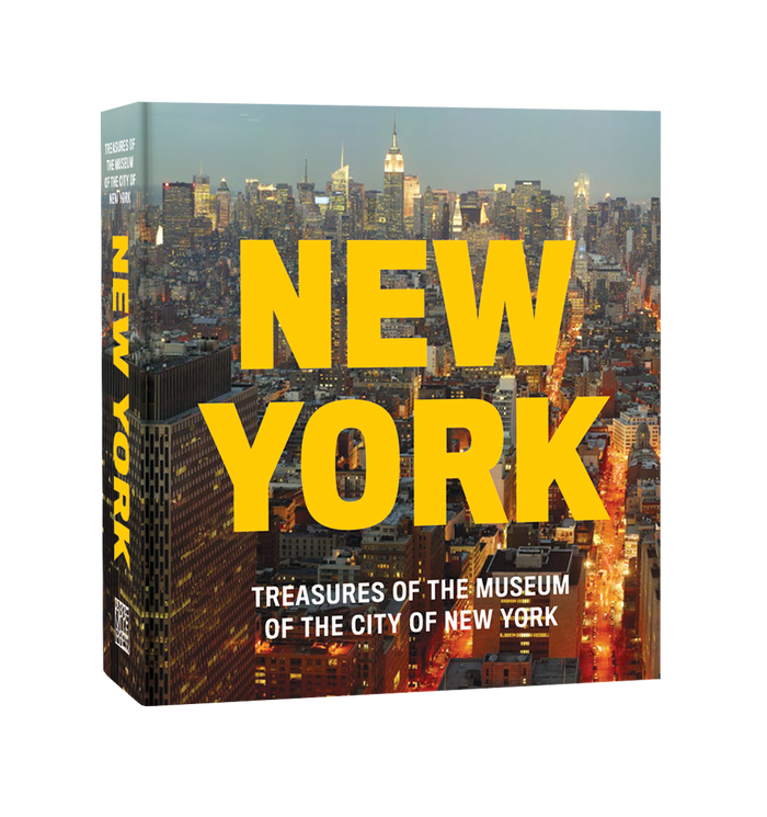 Book cover of New York: Treasures from the Museum of the City of New York, featuring the title "New York" in large, bold yellow lettering above the subtitle. The cover is set against a vibrant photograph of the New York City skyline at dusk, illuminated with colorful city lights beneath a deepening blue evening sky.