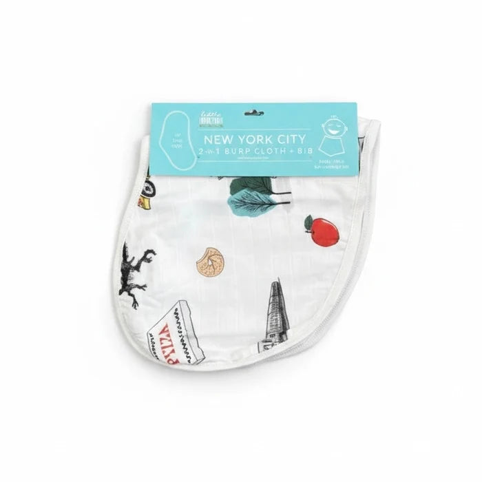 Featured against a white background is the NYC Burp Cloth and Bib Combo in white, decorated with illustrations of iconic New York items, including a red apple, a black-and-white subway car sketch, a pizza box, a sesame bagel, and a few more iconic items on the edges. At the top, a header card displays the product title, “New York City 2-in-1 Burp Cloth + Bib,” along with a die-cut hole for hanging on retail display pegs.