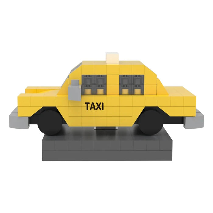 Yellow taxi model made of interlocking bricks on a white background