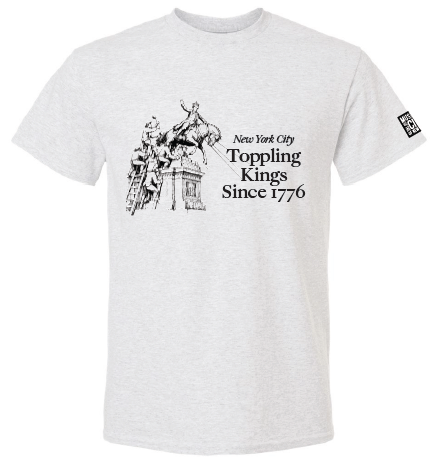 A soft white T‑shirt with bold black graphics on the front. The design includes large lettering that reads “New York City Toppling Kings Since 1776,” above and below a high‑contrast scene of a crowd pulling down a statue with ropes. The fabric feels smooth and comfortable. On the left sleeve, there is a small square black‑and‑white logo for the Museum of the City of New York.