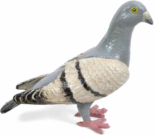 Features a solid cast iron pigeon figurine facing right in profile, hand-painted in soft shades of grayish blue, white, and black, with a lightly distressed finish that gives it a vintage look; each piece is individually hand-finished, so slight variations in color and detailing are to be expected.