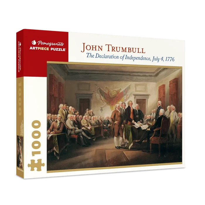 Puzzle box featuring a painting of John Trumbull's 'The Declaration of Independence' with Pomegranate Artpiece Puzzle branding.
