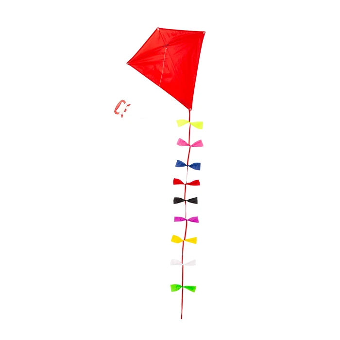 The image shows a classic, bright red diamond shaped kite with flowing multi color ribbon tails that add movement. The kite string is neatly looped around a matching red handle, all set against a clean white background.